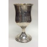 A good Scottish silver tapering goblet on spreadin