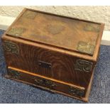 An oak and brass mounted stationary box. Est. £40