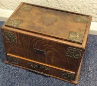 An oak and brass mounted stationary box. Est. £40