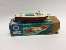 A Sutcliffe model of a speedboat, together with a