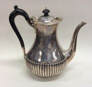 A silver half fluted coffee pot. Sheffield. By R&E
