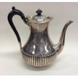 A silver half fluted coffee pot. Sheffield. By R&E