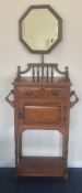 An Edwardian mahogany two drawer shaving stand on