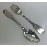 A French silver fiddle pattern fork together with