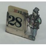 A novelty silver calendar in the form a gentleman