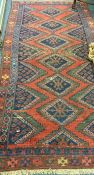 An Antique tapestry Oriental rug in bright colours