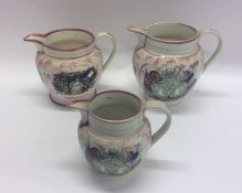 A good set of three graduated Sutherland jugs with