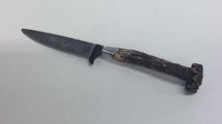 An Antique silver mounted knife of tapering form.