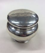 A Continental silver tea canister with lift-off co