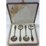 A cased set of four French preserve spoons decorat