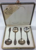 A cased set of four French preserve spoons decorat