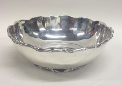 A Mexican circular silver fruit dish decorated wit