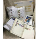 A collection of First Day covers, coins etc. Est.