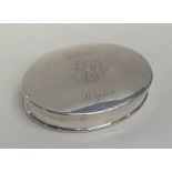 A good oval Georgian silver snuff box with lift-of