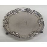 A good George II silver waiter with gadroon rim an