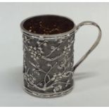 An attractive Chinese silver mug of typical design