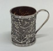 An attractive Chinese silver mug of typical design