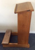 A small oak lectern with sloping front. Est. £20 -