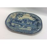 An Antique blue and white oval meat dish. Est. £30