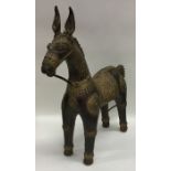 A Continental brass mounted model of a horse with