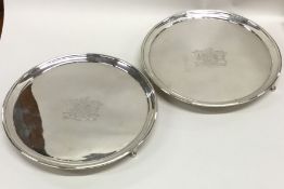 A good pair of Georgian silver waiters with reeded