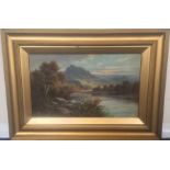 FRANK HIDER (1861 - 1933): A gilt framed river lan
