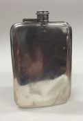 A massive silver hip flask with hinged top. Sheffi