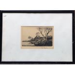 A framed and glazed monochrome etching depicting a