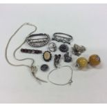 A bag containing silver necklaces, paste buckles e