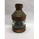 A large copper mounted Masthead ships lamp. Est. £