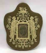 An attractive carved ivory mounted picture frame d