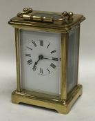 A small brass mounted carriage clock. Est. £25 - £