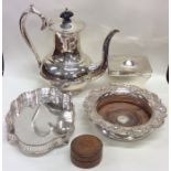 A silver plated water pot, coaster, tea caddy etc.