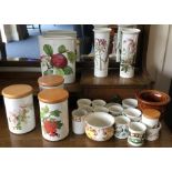 A collection of Portmeirion storage jars, vases an