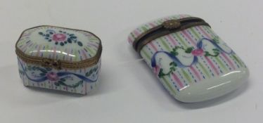 Two Limoges pill boxes with hinged tops. Marked to