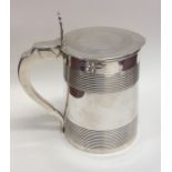 A good quality Georgian silver lidded tankard with