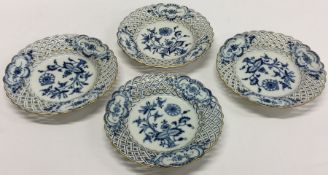 A set of four Meissen blue and white plates decora