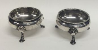 A pair of Georgian Adams' style circular salts on