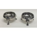 A pair of Georgian Adams' style circular salts on