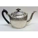 A good Georgian silver bright cut teapot decorated