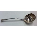 A Georgian aesthetic silver sauce ladle with flute
