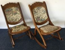 A pair of carved folding rocking chairs. Est. £50