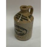 A stoneware bottle entitled, "R Southwood and Co.