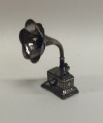 A novelty silver doll's house gramophone. Approx. 1