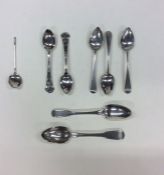 A bag containing numerous silver teaspoons. Variou