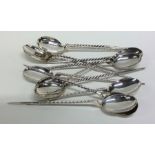 A rare set of twelve silver ice cream spoons with