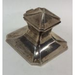 A small stylish silver capstan shaped inkwell. Bir