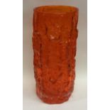 A tall Whitefriars orange glass vase. Approx. 23 cm