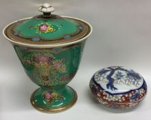 A Noritake vase and cover together with an Imari p