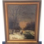 A large gilt framed oil on canvas depicting stags